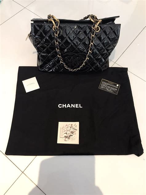 vintage chanel patent leather with raised logo